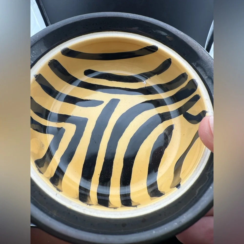 2 small dog dishes. Chic tiger print and bone print. 5”
